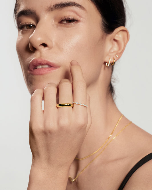 closeup view of gold pavé stackable ring