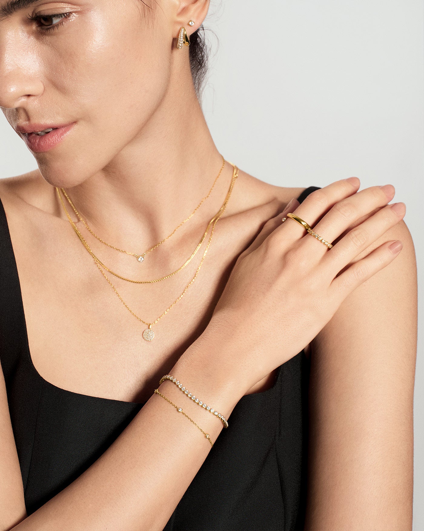 old Round Solitaire Cubic Zirconia Necklace styled with matching gold ring
