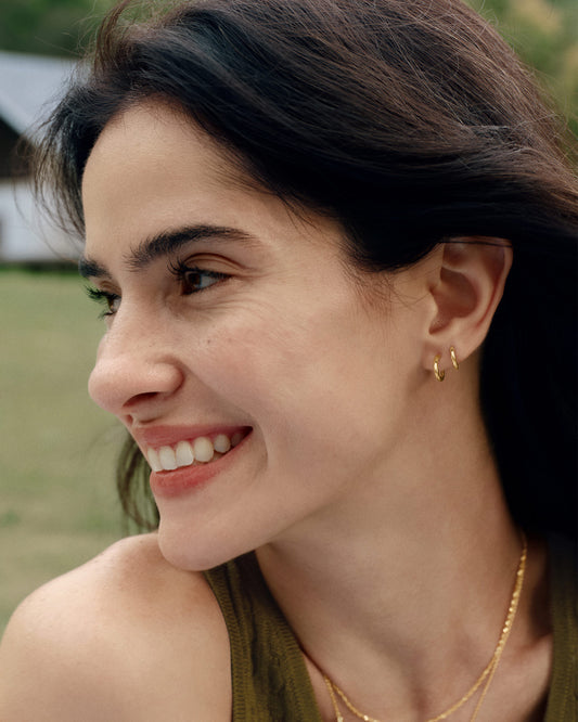 Gold Smooth Huggie Hoop Earrings Wron on Ear