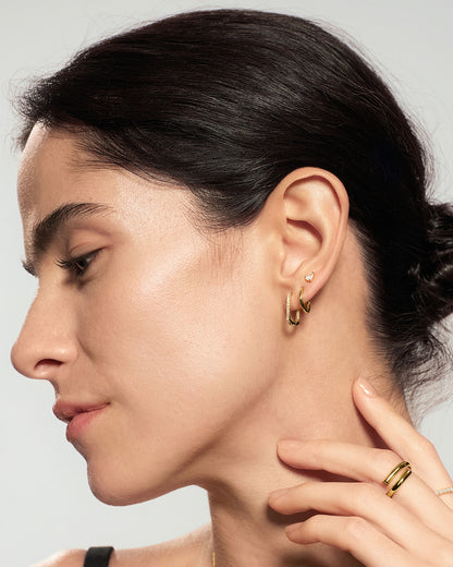 Modern gold rectangular oval hoops styled