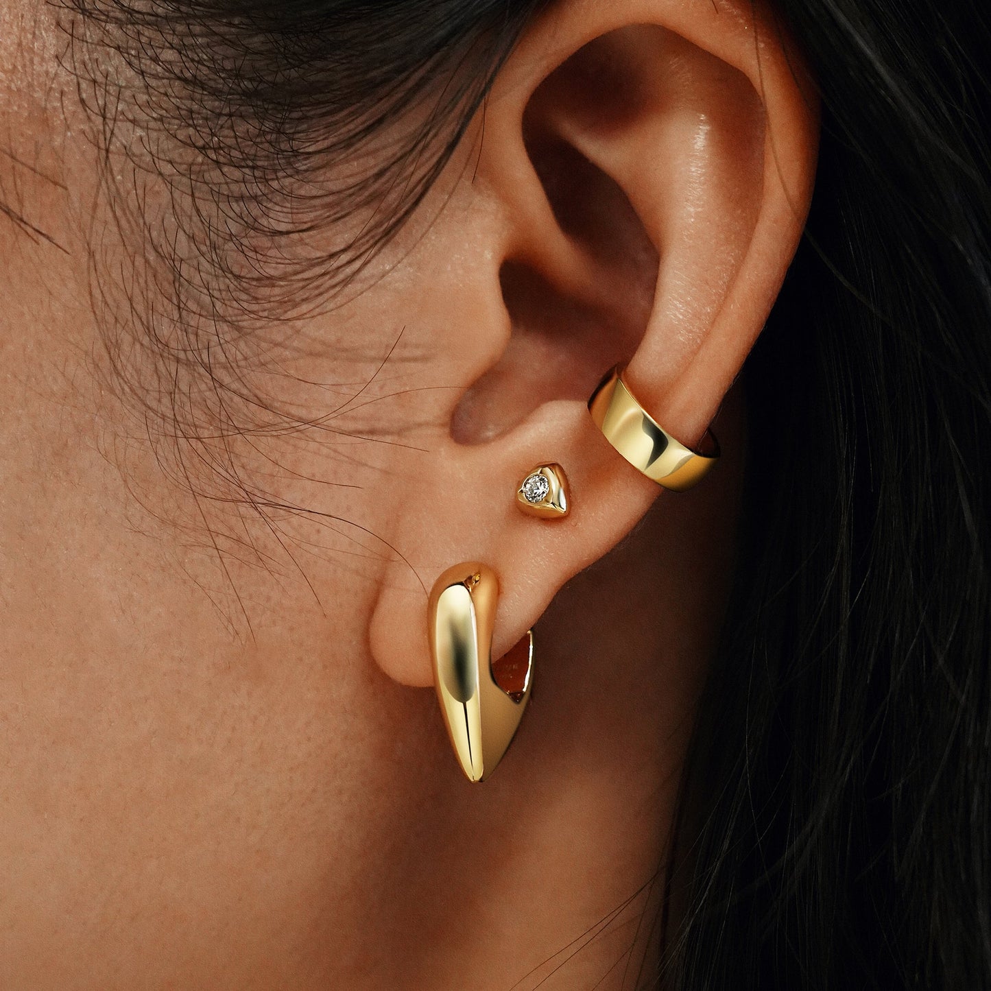 Gold Sparkling Shield Stud Earrings