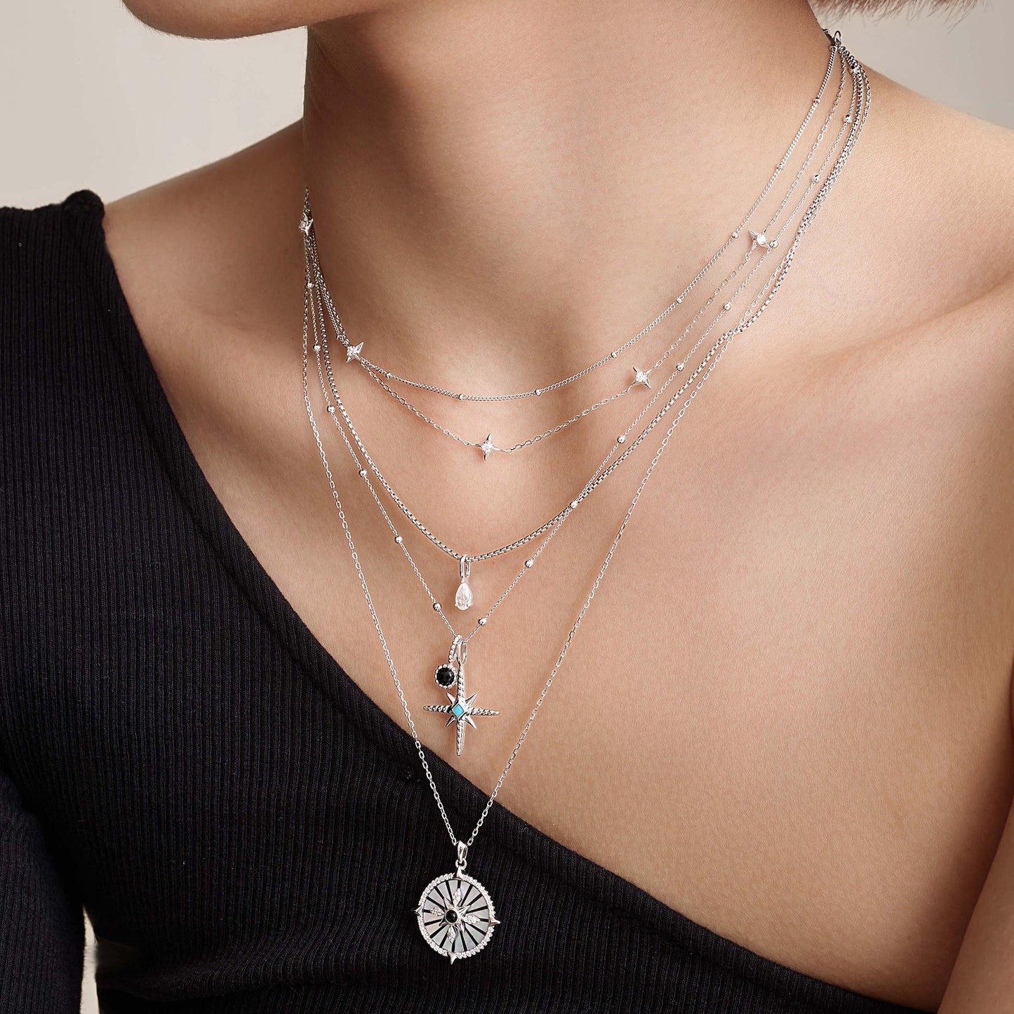 Silver Black Onyx and Mother of Pearl Charm