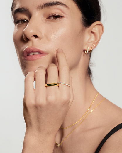 closeup view of gold pavé stackable ring