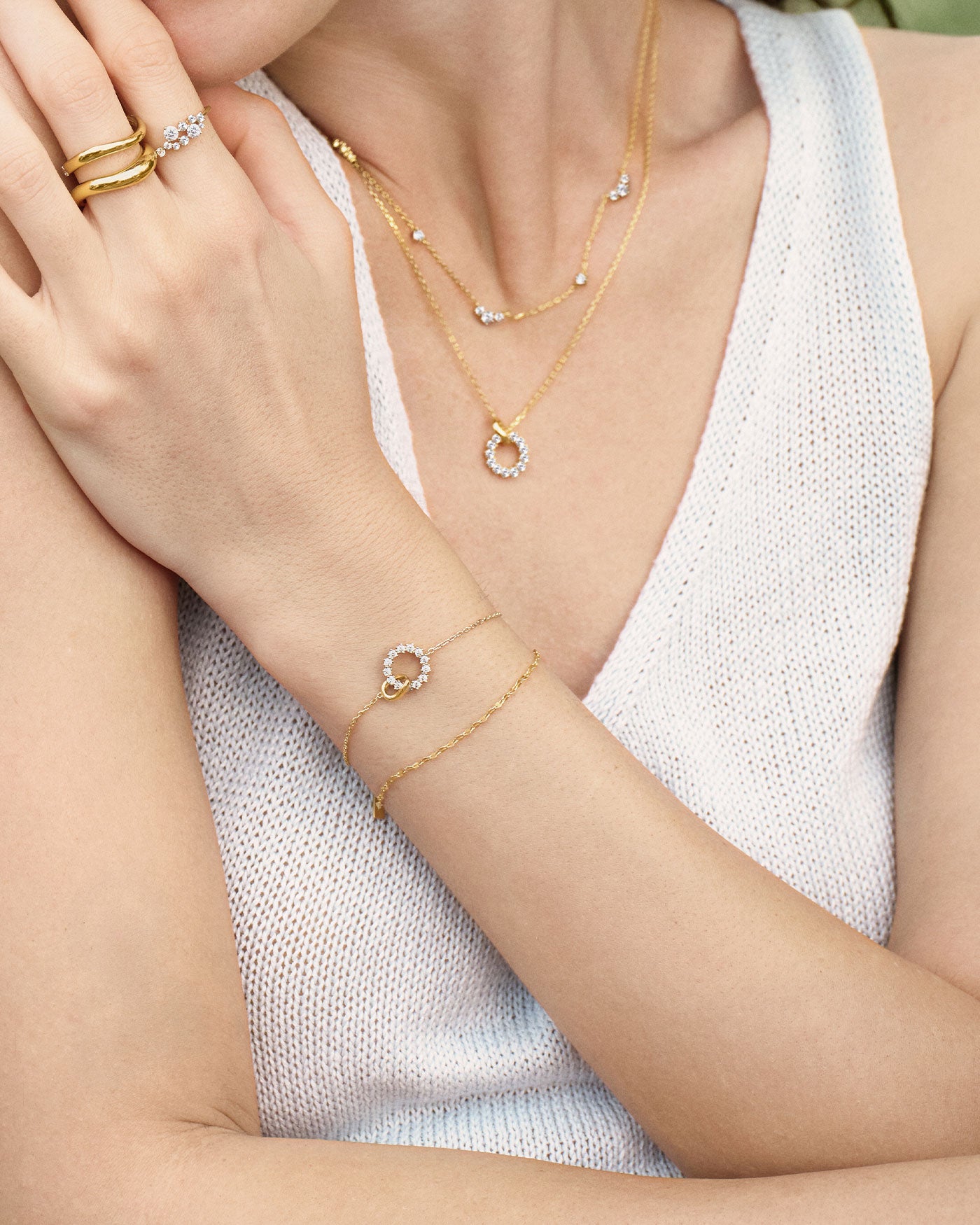Lifestyle shot of necklace and bracelet set
